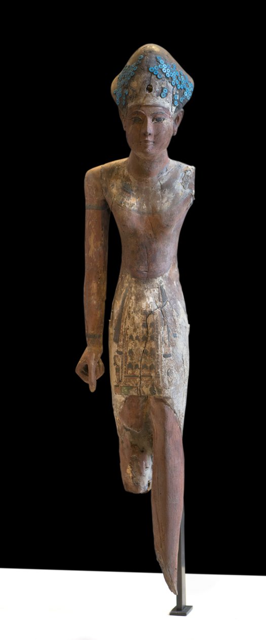 Estátua do cocar Soberano Ramesside da coroa azul e vestindo a tanga da frente de Egyptian 19th Dynasty