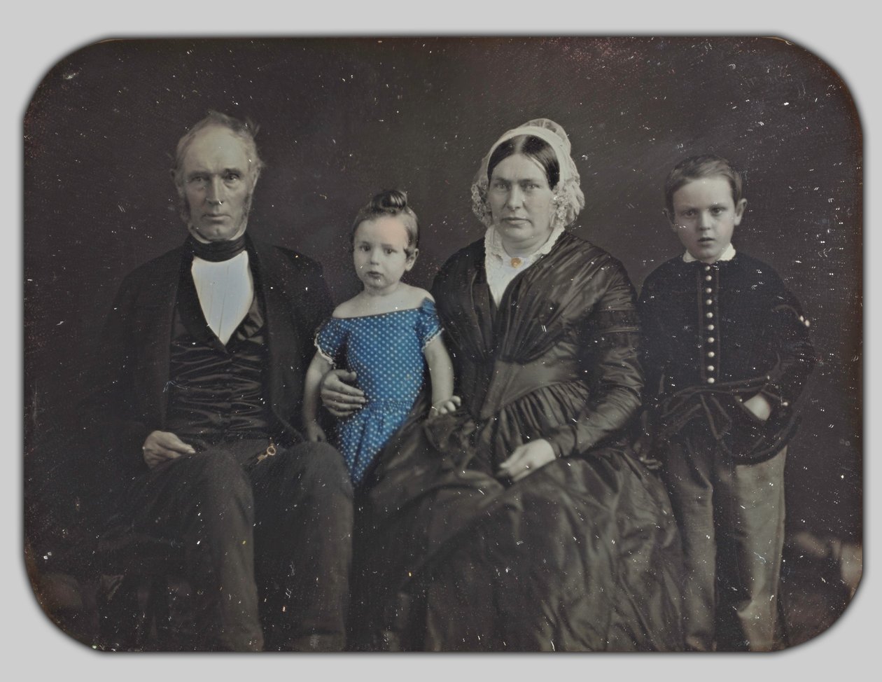 A mãe, o pai e a família da Sra. Stanford de English