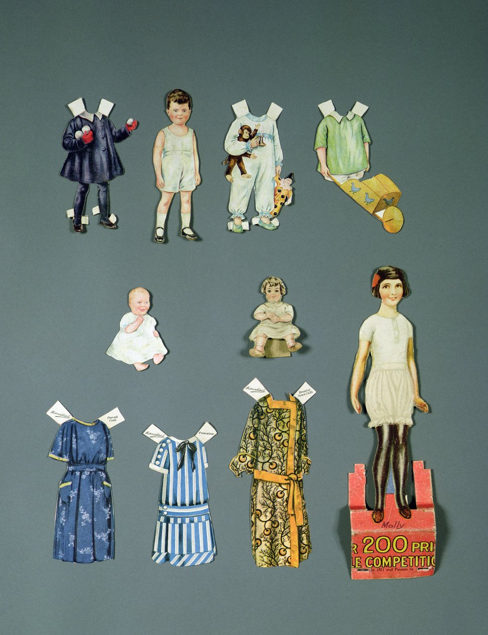 Recorte bonecas e roupas, no final da década de 1920 e início da década de 1930 de English School