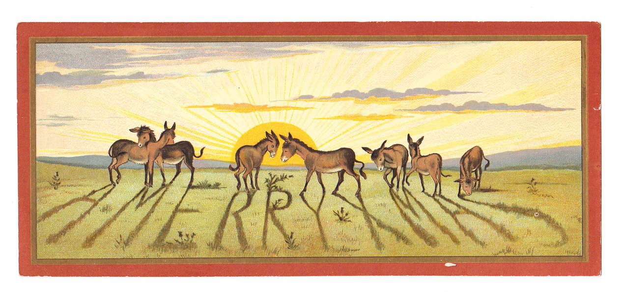 Um cartão de Natal vitoriano de um pôr do sol projetando sombras em uma fileira de burros que dizia "Feliz Natal", por volta de 1880 de English School
