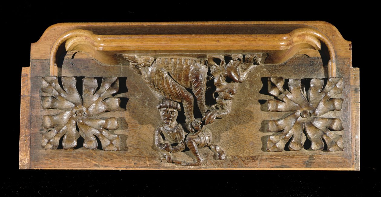 Um misericordioso representando uma pequena figura coberta por um monstro, New College Chapel, Oxford, final do século XIV (madeira) de English School