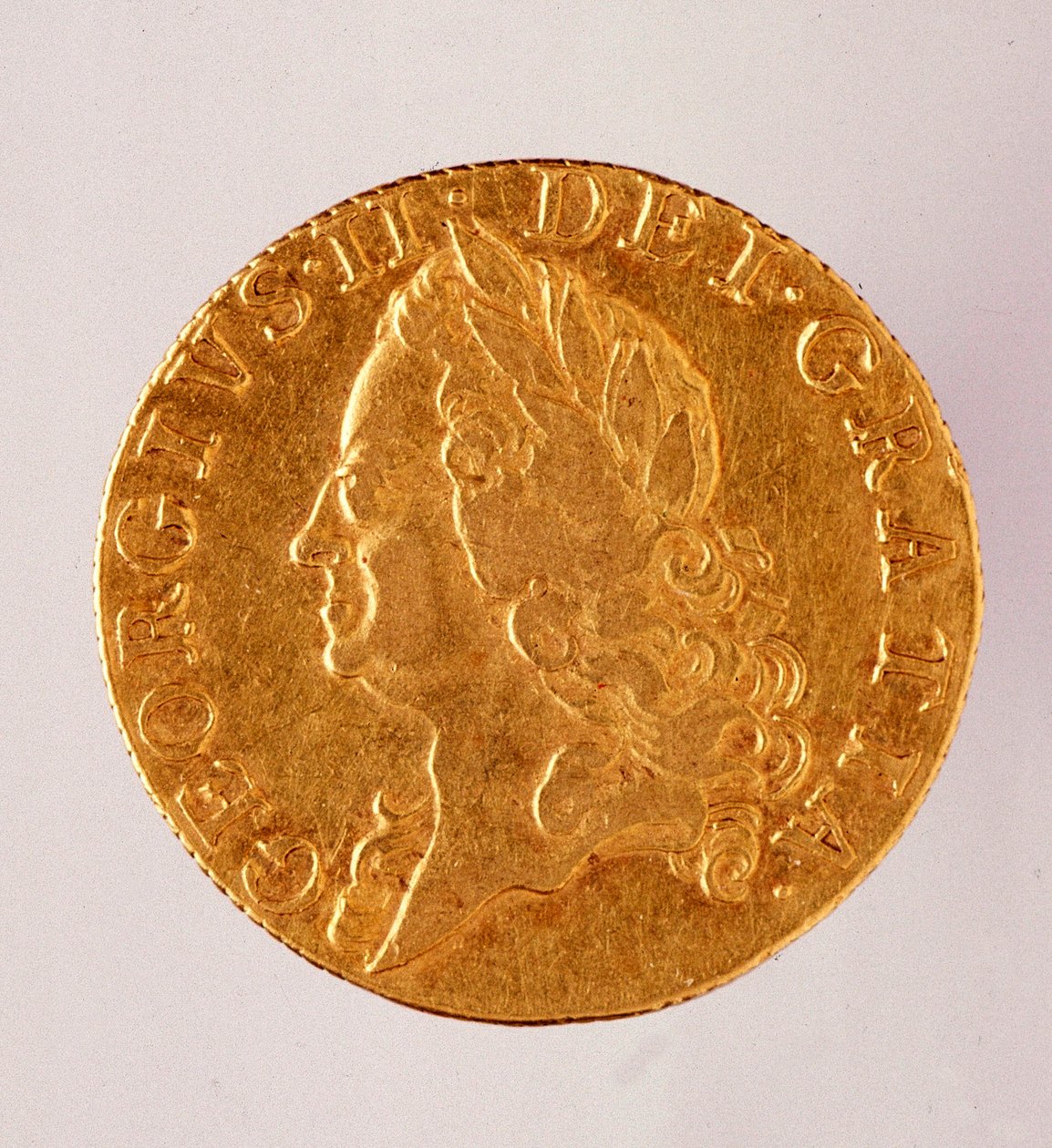 Guiné dourada (guiné), reinado do rei Jorge II (1714-1760) Século XVIII. Diam. 2,5 cm Nápoles, museo archeologico de English School