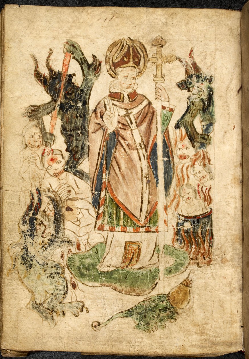 São Patrício, vestido de bispo, segurando um crucifixo e fazendo um gesto de bênção, está na ilha de Lough Derg, Donegal (Irlanda), cercado por demônios e almas atormentadas. Imagem tirada de ""Purgatory of Saint Patrick"", manuscrito em inglês, m de English School