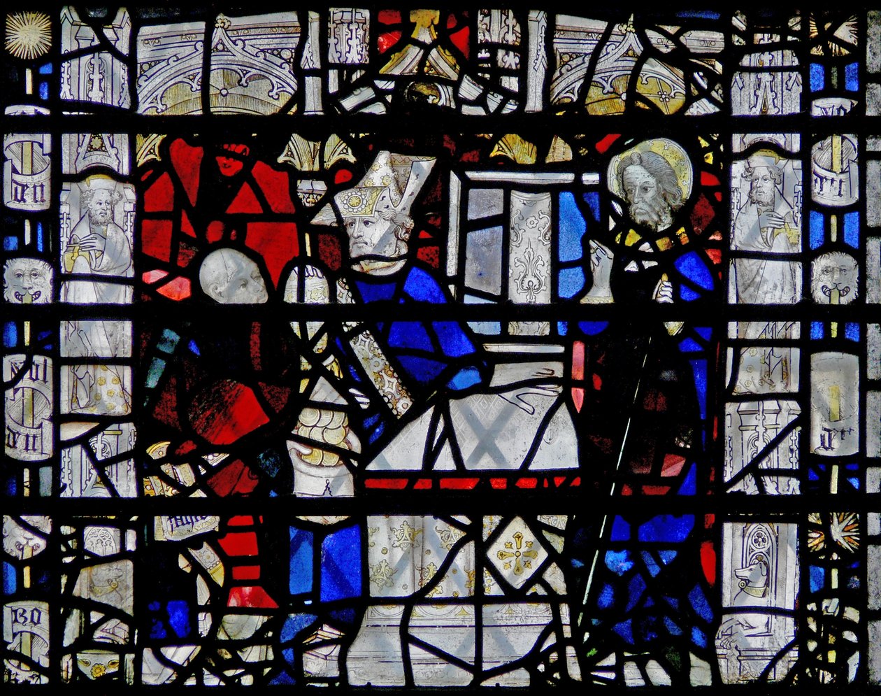Janela w6 representando uma cena da vida de São Nicolau; fronteira com figuras de English School
