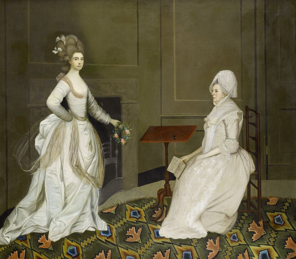 Duas senhoras num interior, uma a ler, a outra a segurar uma grinalda de flores de English School, 18th Century