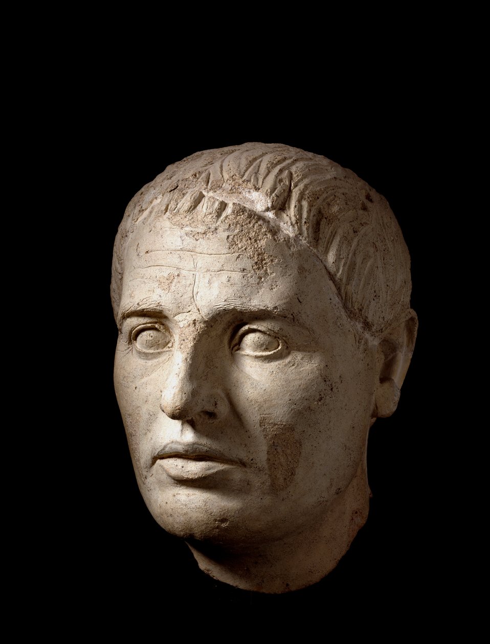 Cabeça de um homem, em argila clara, século II a.C. de Etruscan