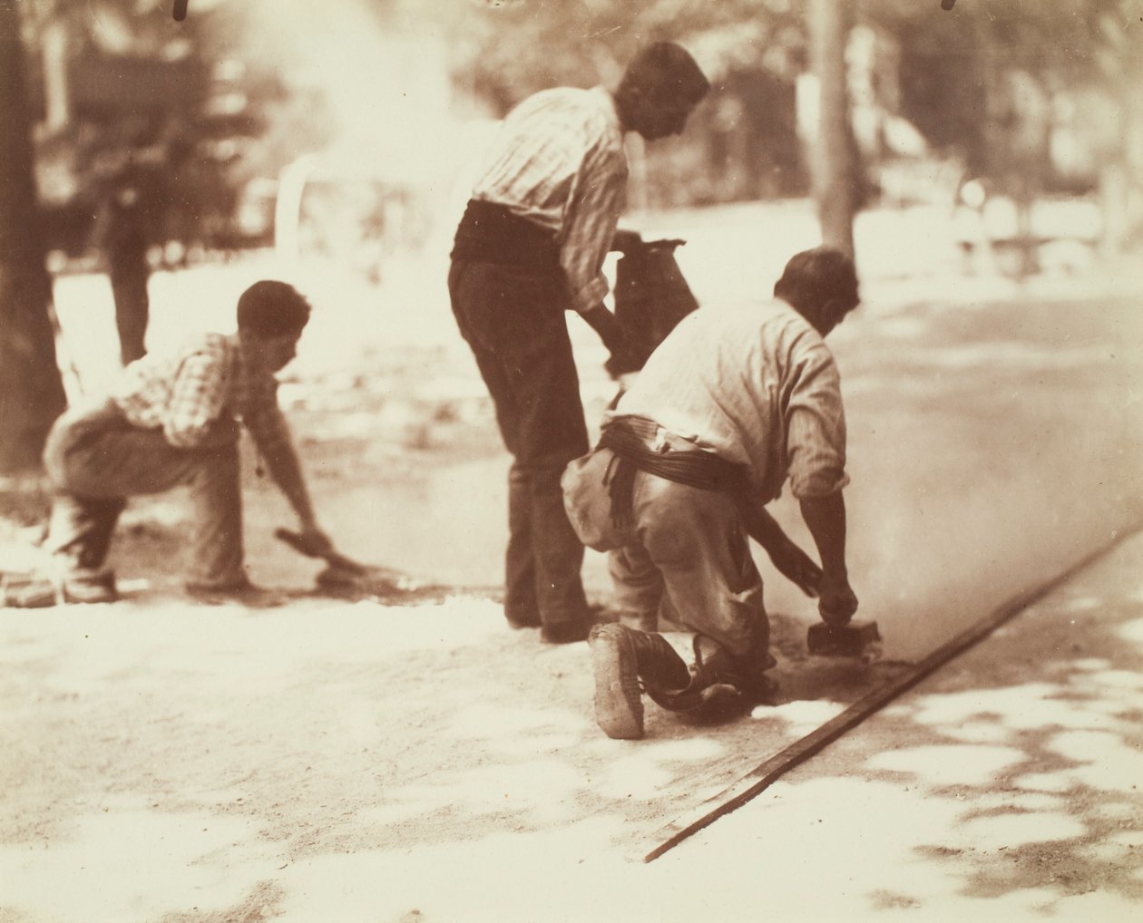 Trabalhadores do asfalto de Eugène Atget
