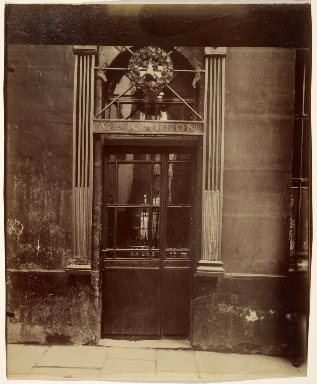 Letreiro, rue Notre-Dame de Bonne Nouvelle de Eugène Atget