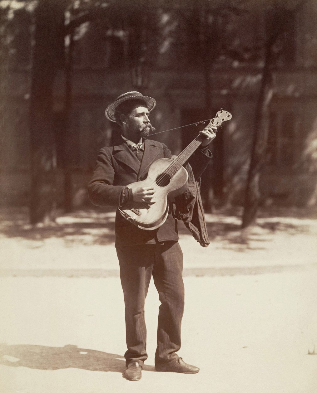 Guitarrista, Paris de Eugène Atget