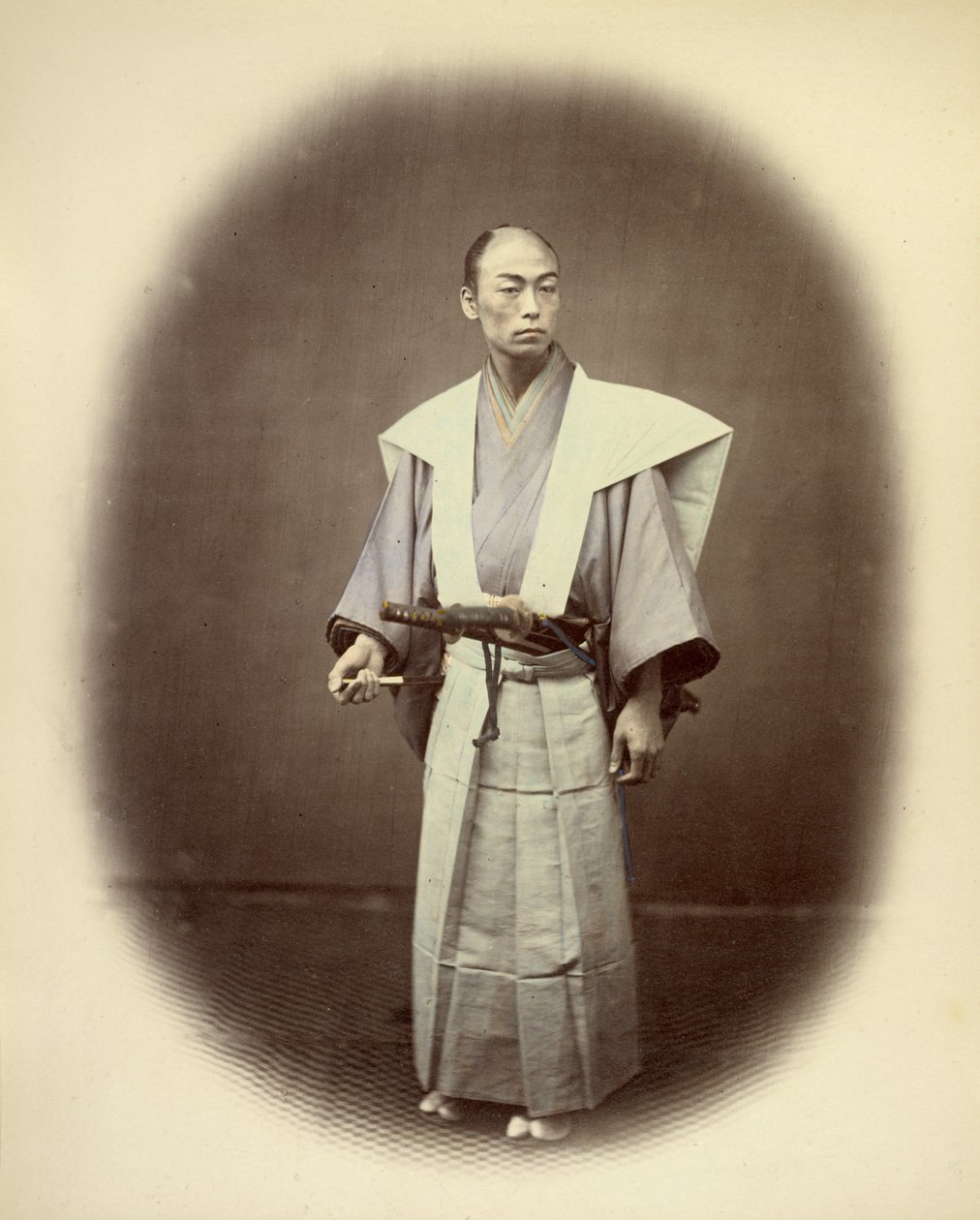 Yakonin japonês em traje de cerimónia de Felice Beato
