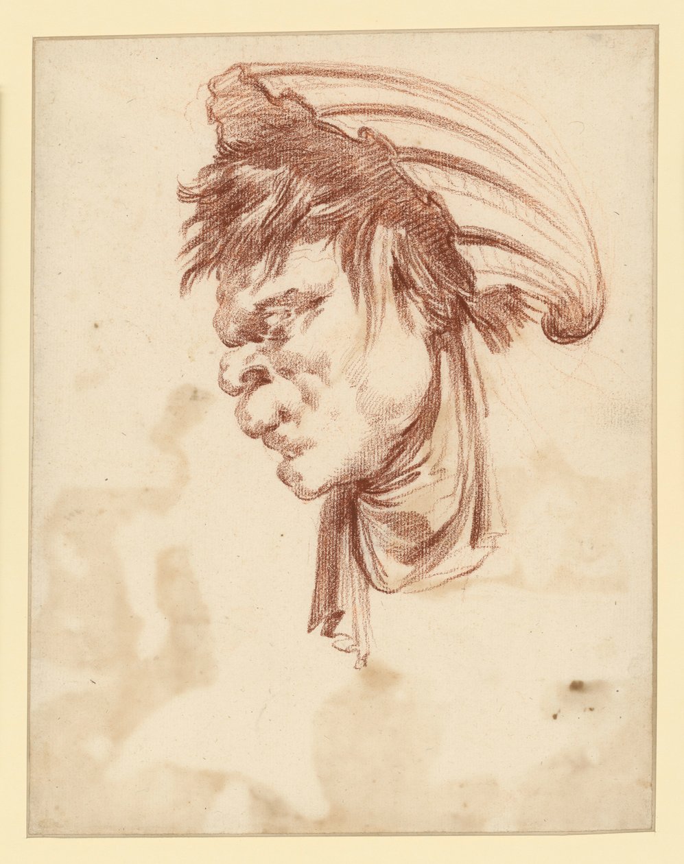 Cabeça grotesca vista de perfil para a esquerda, com uma concha como adereço na cabeça de François Boucher