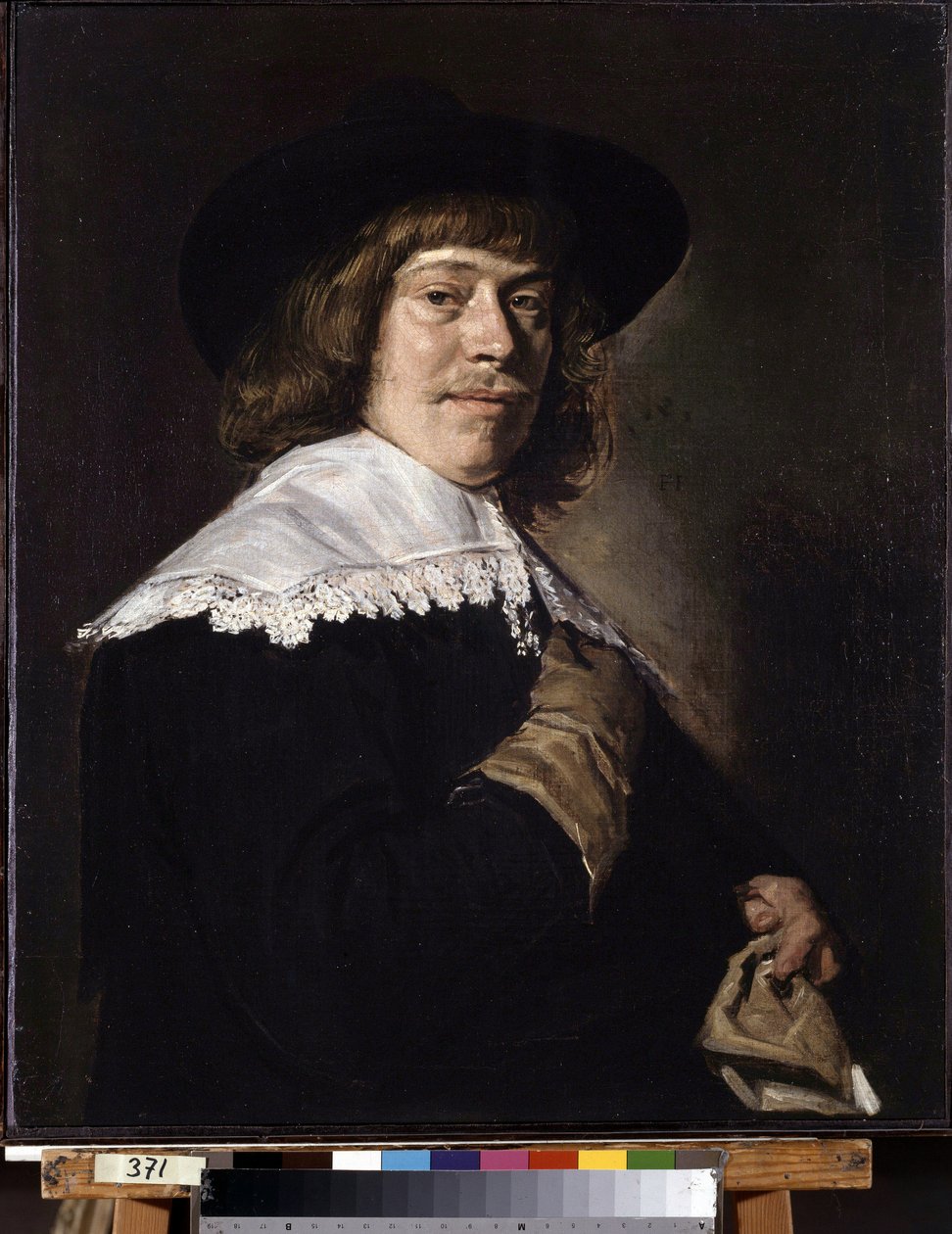 Retrato de um homem segurando uma luva. Retrato de um jovem segurando uma luva. Pintura de Frans Hans Hals I (1581-1666), cerca de 1650. Óleo sobre tela. Arte holandesa, estilo barroco. Museu Hermitage, São Petersburgo. de Frans Hals