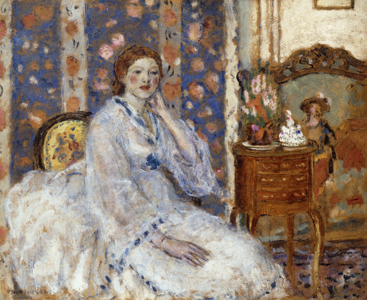 Mulher sentada em uma poltrona de Frederick Carl Frieseke