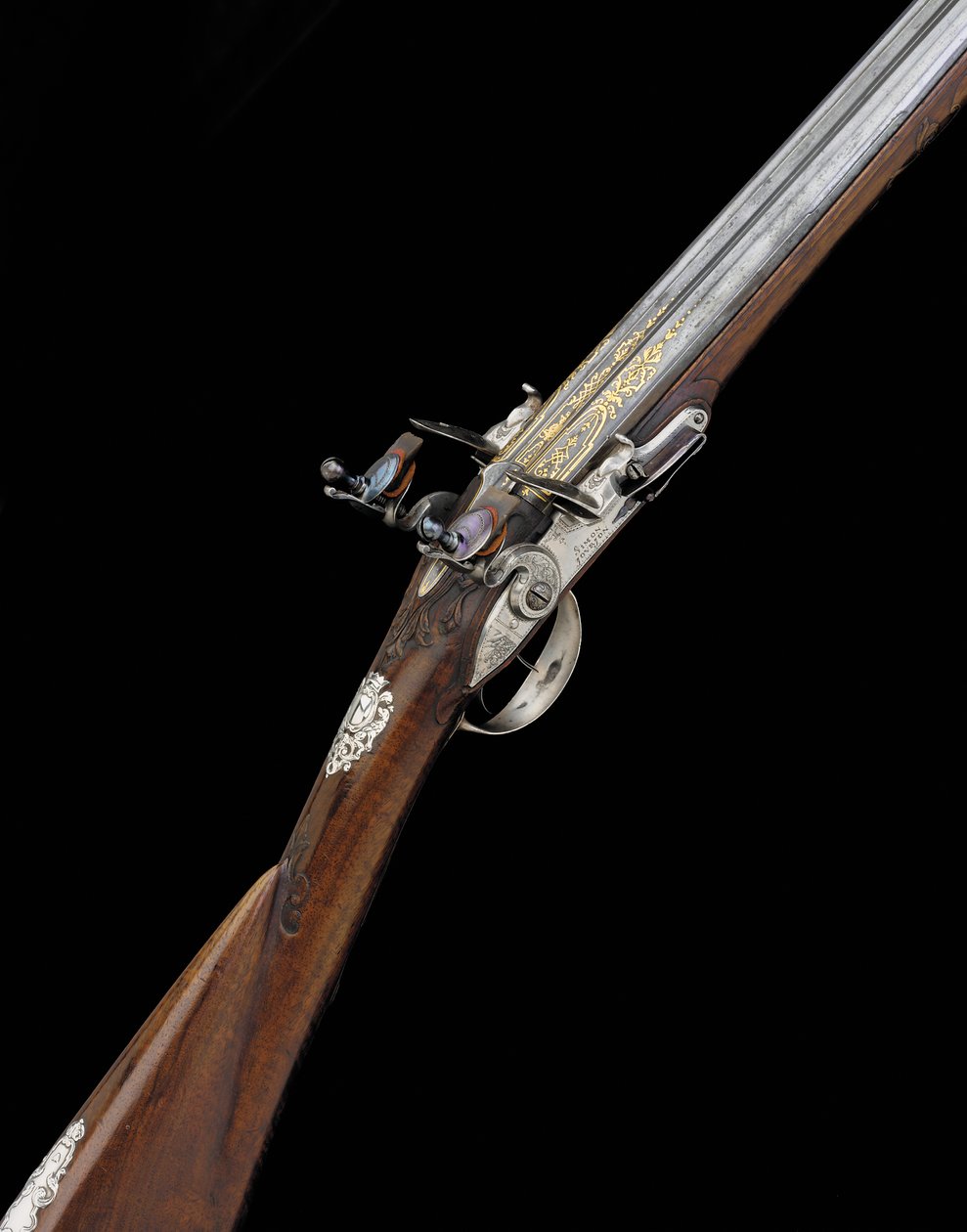Uma fina e rara pistola esportiva francesa DB Flintlock com 20 furos montada em prata, c.1725 de French School