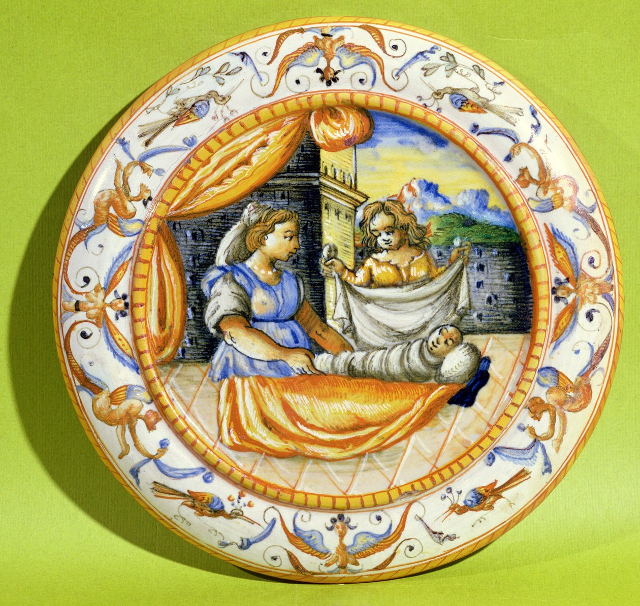 Placa de parto representando o recém-nascido enrolado em panos, de Lyon (faiança) de French School