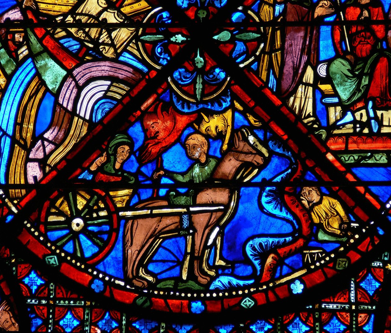 Detalhe de uma janela representando cenas da vida de Santo Estêvão: cavalos, carroça e demônios de French School