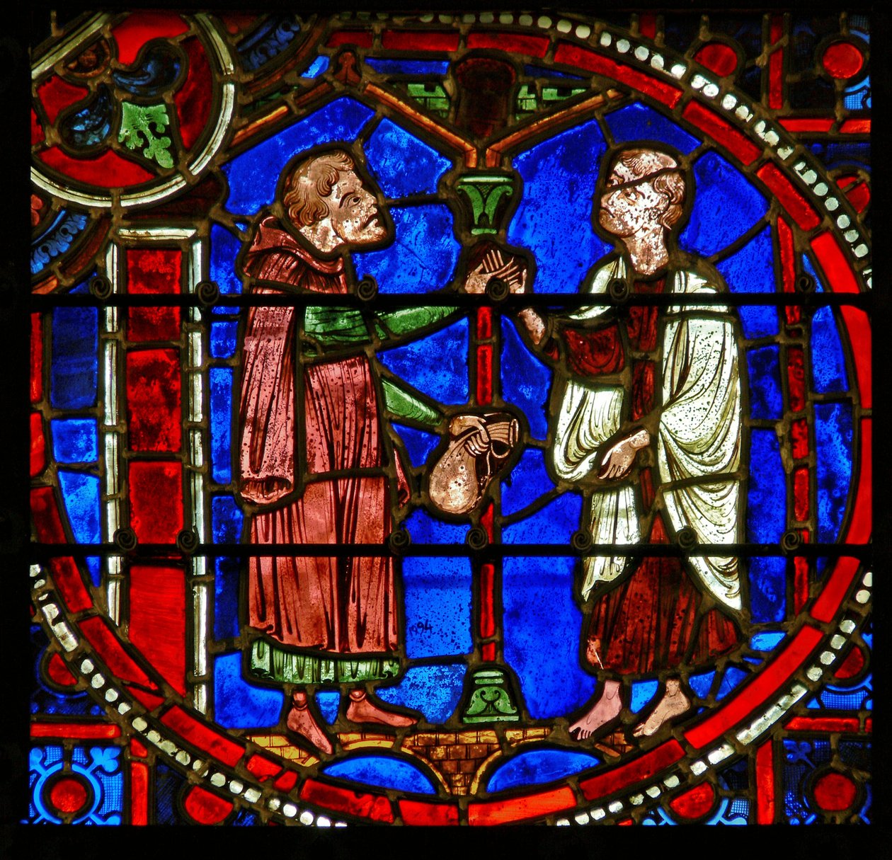 Detalhe de uma janela representando cenas do milagre de Teófilo de French School