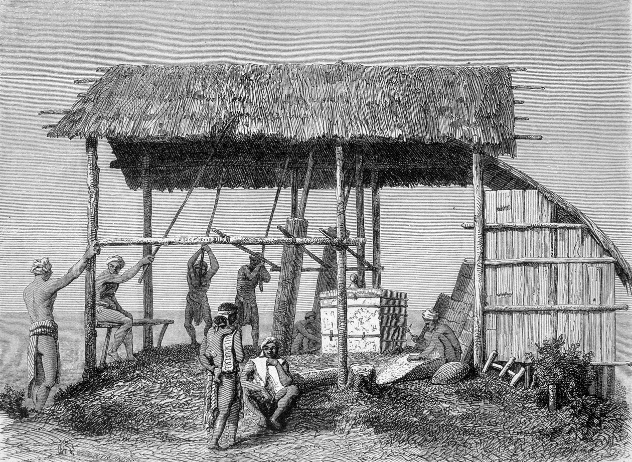Ilustração publicada na edição de 1862 de "Le Tour du monde", retratando um ferreiro nos dayaks da ilha de Bornéu. Gravura. de French School