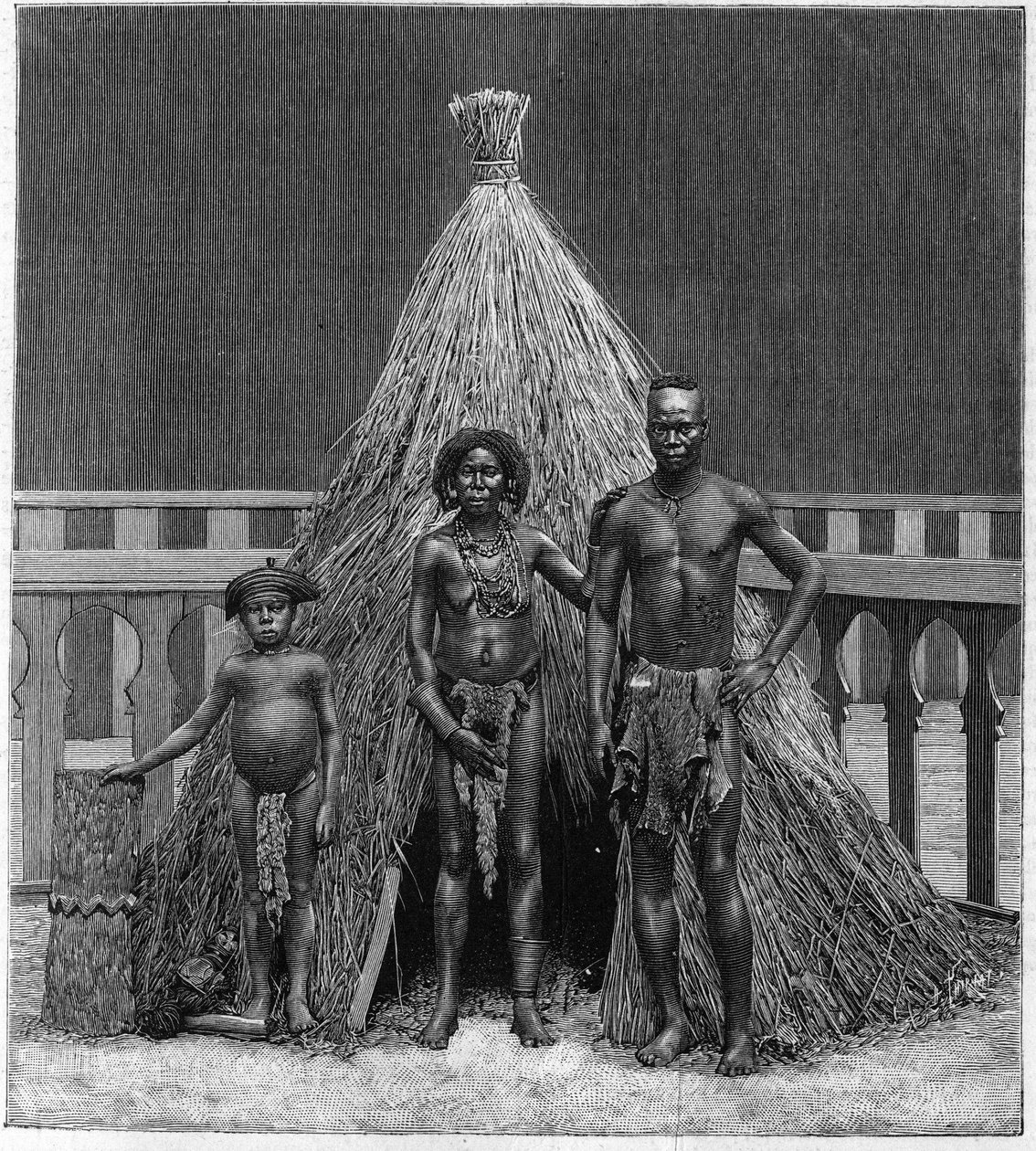Homem, mulher e criança da trupe angolana exposta em Paris durante a Exposição Mundial de 1889 (Jardim Zoológico Humano). de French School