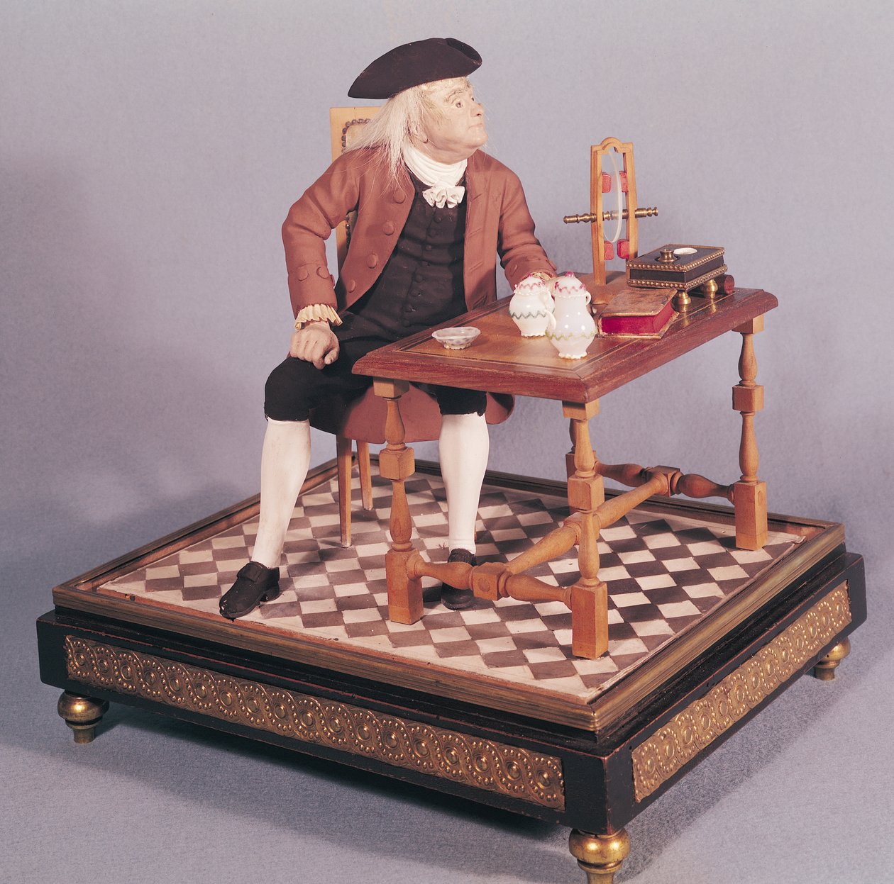Modelo de Benjamin Franklin (1706-90) em sua mesa, final do século XVIII de French School