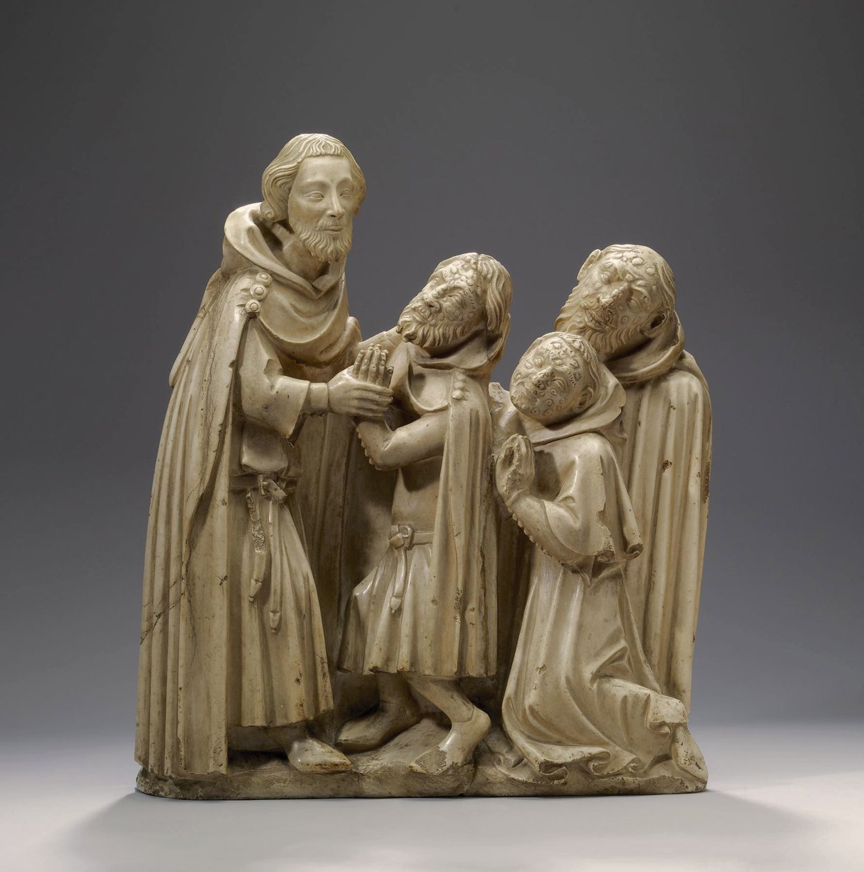 Santo Elzear de Sabran curando três leprosos, c.1373 (alabastro) de French School