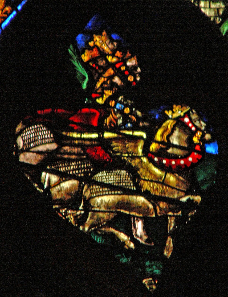 A rosácea oeste representando uma cena do Livro do Apocalipse: Gafanhotos como cavalos preparados para a batalha, com cabeças como homens, cabelos como mulheres e rabos como escorpiões (9: 7 10). de French School