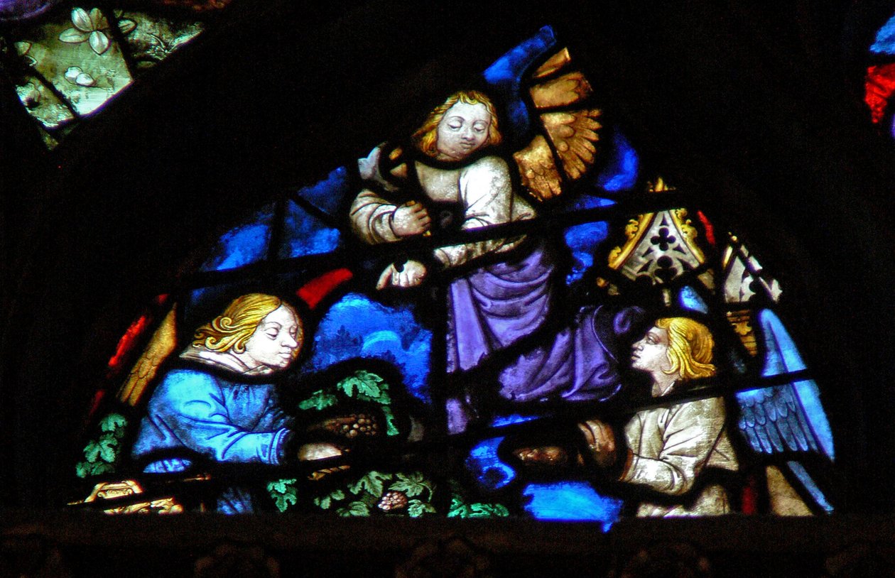 A rosácea oeste representando uma cena do livro do Apocalipse: coleta das uvas com a foice (14: 17-18). de French School