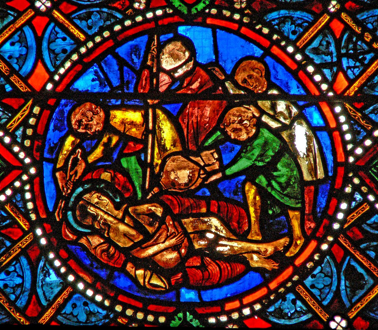 Janela s4 representando uma cena da vida de Santa Ágata; o santo sendo assado vivo de French School