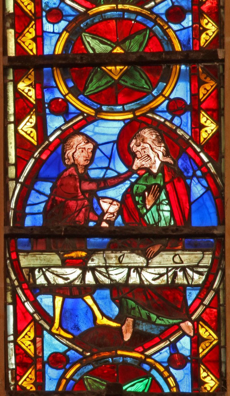 Janela w213 representando uma cena da vida de St Thomas: o santo em um banquete de casamento para a filha do rei da Índia tem o rosto golpeado por um copeiro de French School