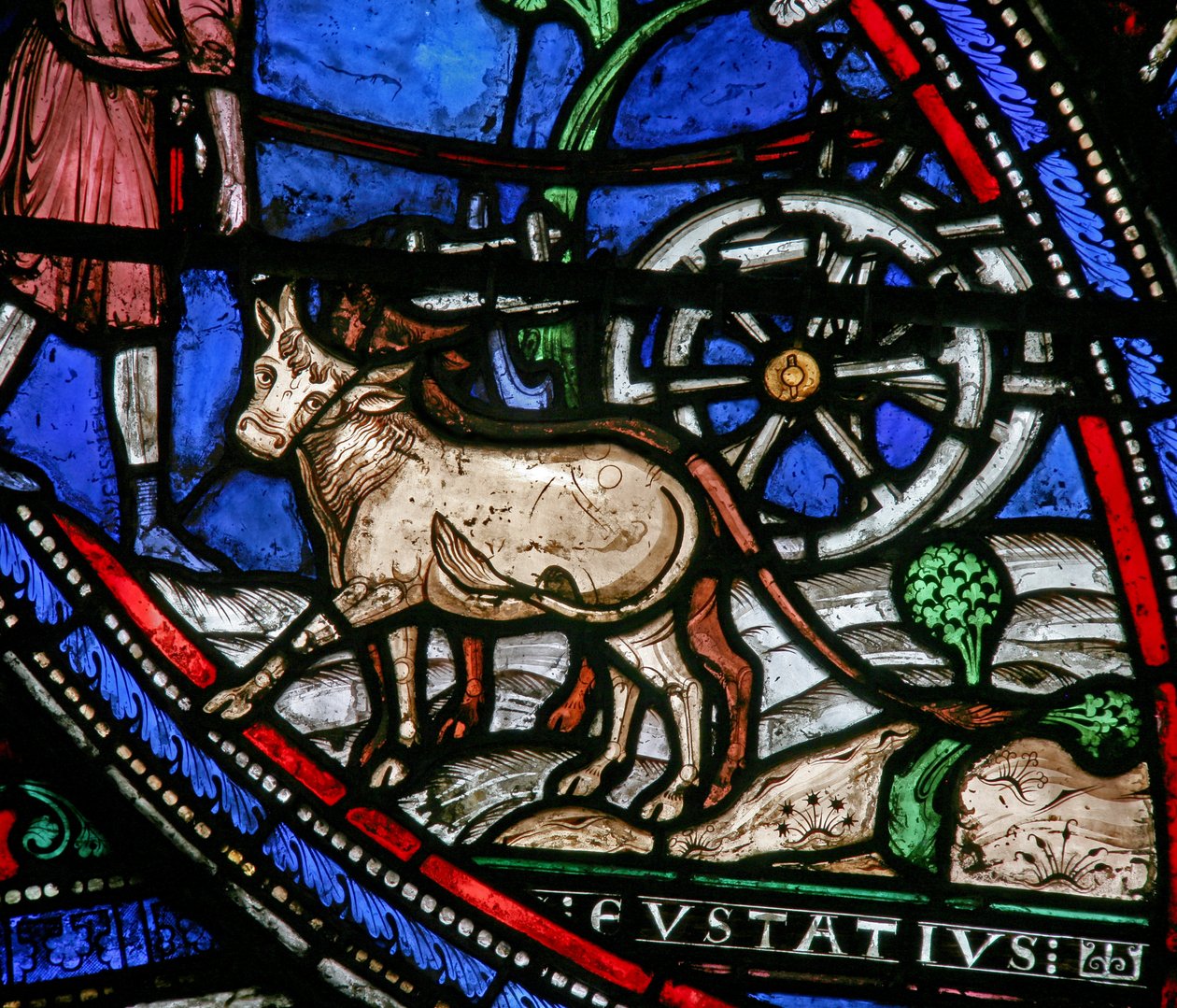 Janela w21 representando uma cena da vida de St Eustache: ele trabalha a terra de French School
