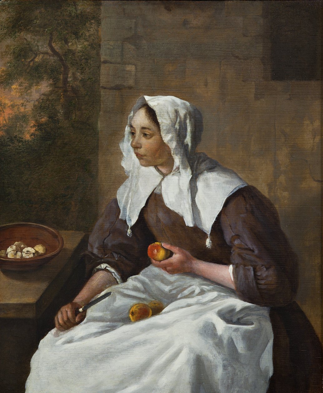 Dinamarquês: Rapariga a descascar maçãs Rapariga a descascar maçãs de Gabriel Metsu