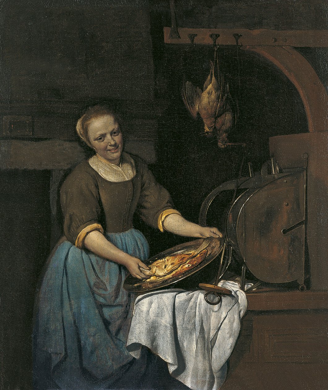 Empregada de cozinha a preparar peixe de Gabriel Metsu