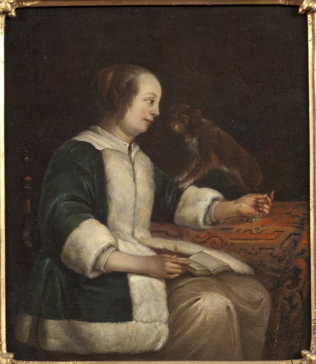 Retrato de uma dama com um cão de Gabriel Metsu