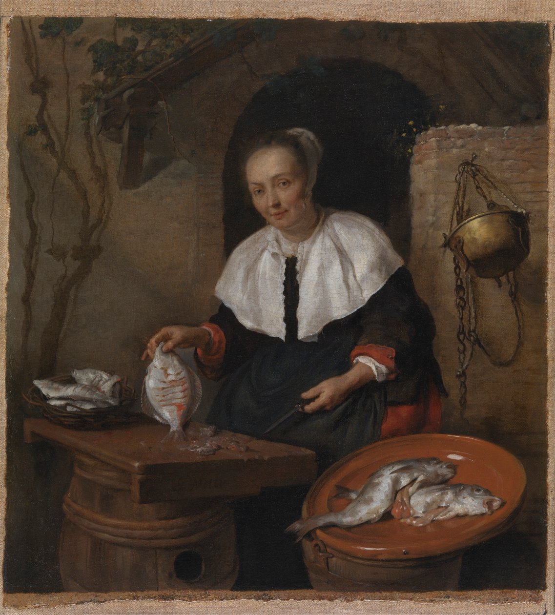 Mulher a limpar peixe de Gabriel Metsu