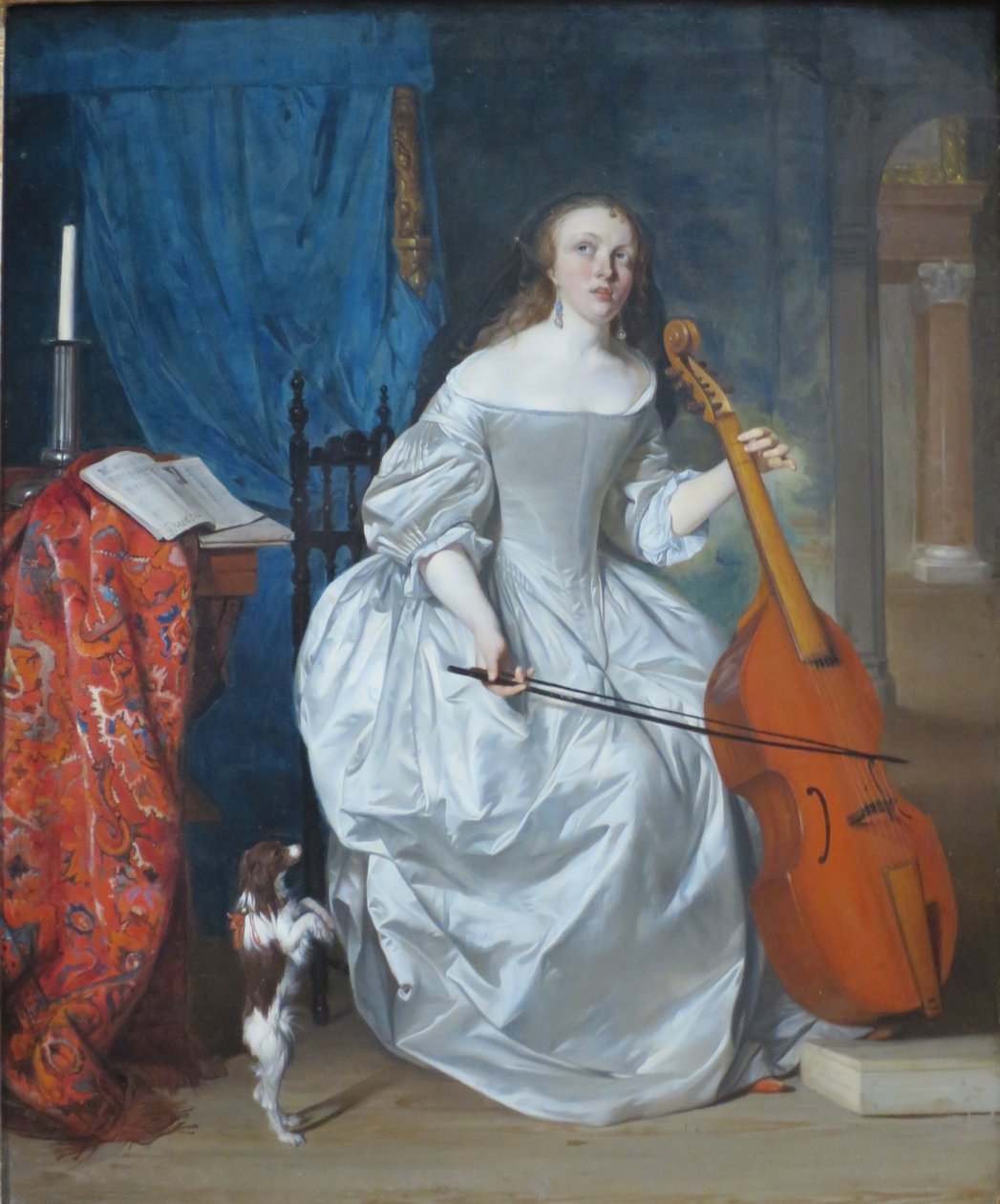 Mulher a tocar uma viola de gamba de Gabriel Metsu