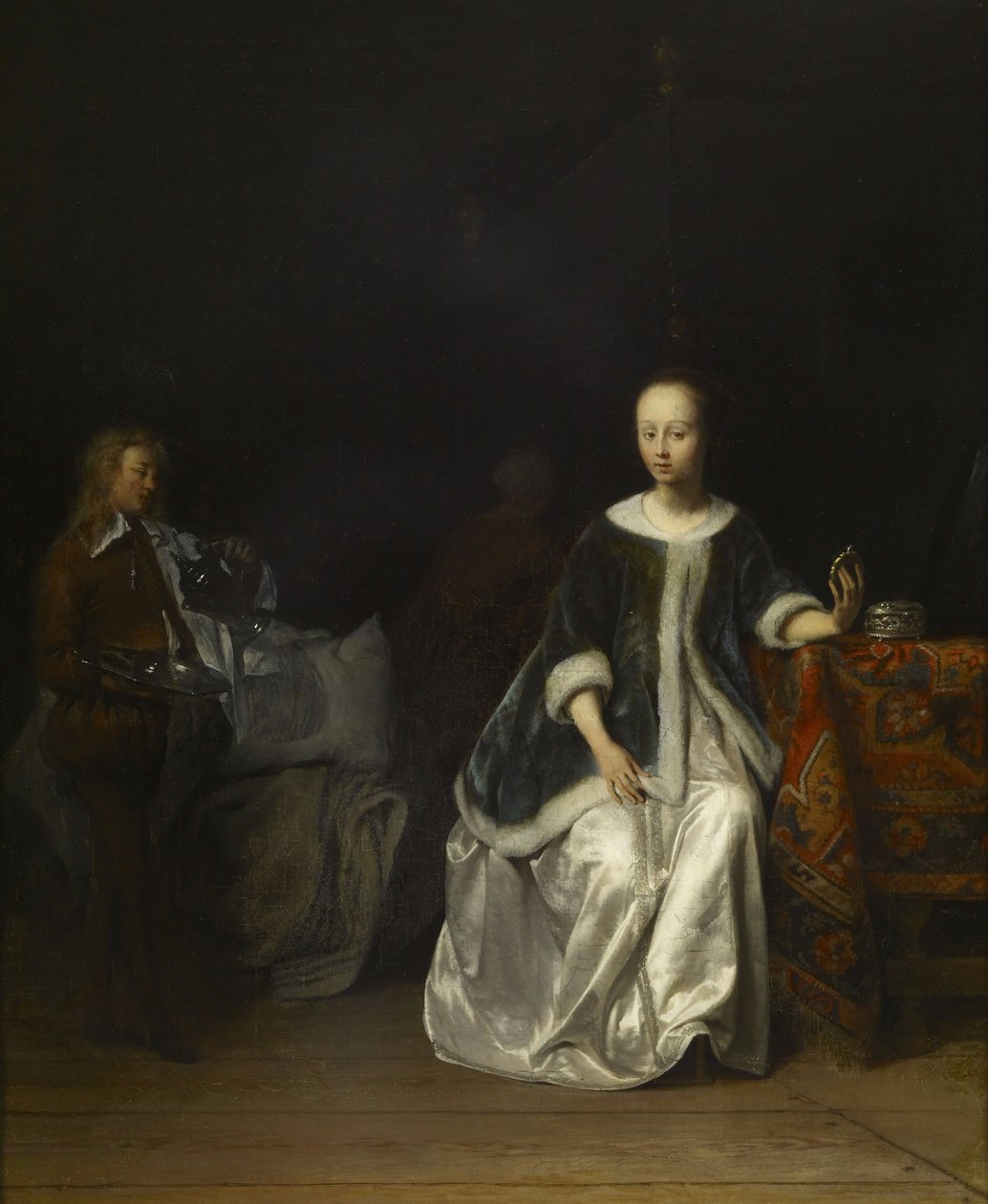 Uma senhora em seu banheiro de Gabriel Metsu