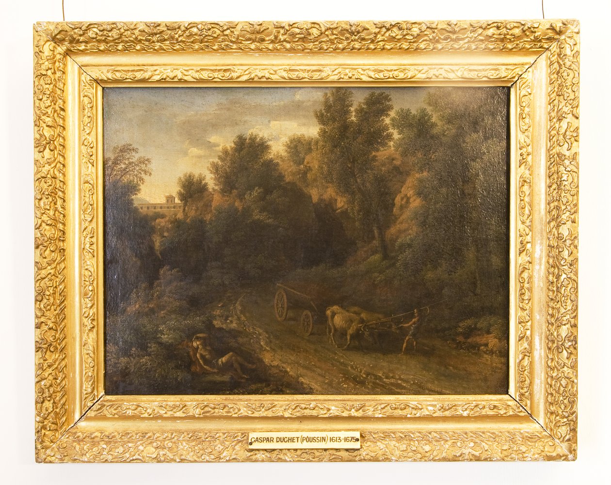 Uma paisagem clássica com um carrinho de boi e figuras de Gaspard Poussin Dughet