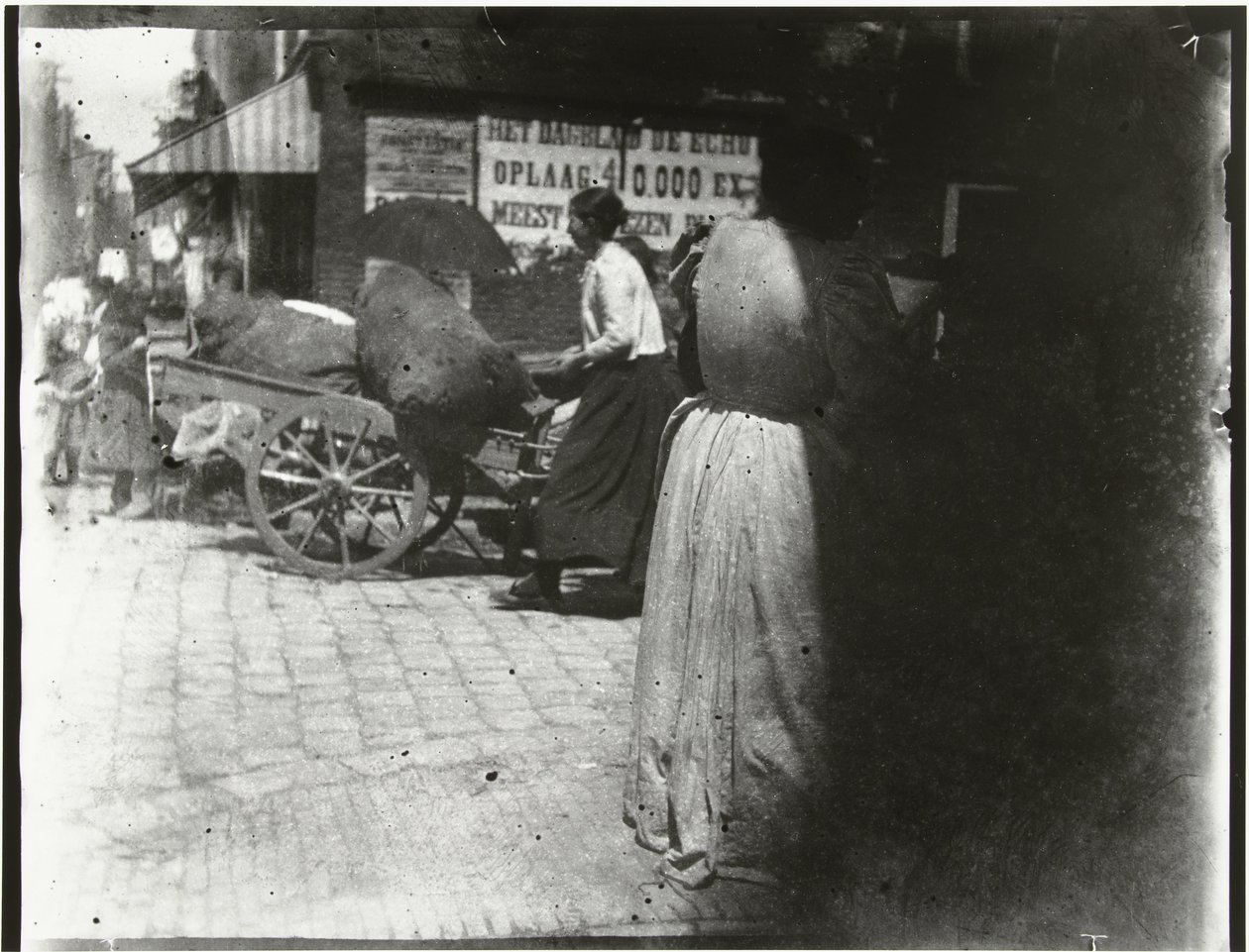 Actividade comercial em Houtkopersdwarsstraat e Jodenbreestraat em Amesterdão de George Hendrik Breitner