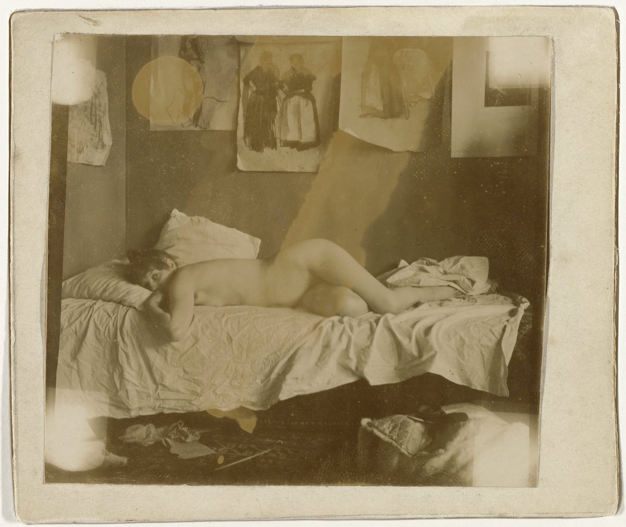 Marie Jordan deitada nua em uma cama de George Hendrik Breitner