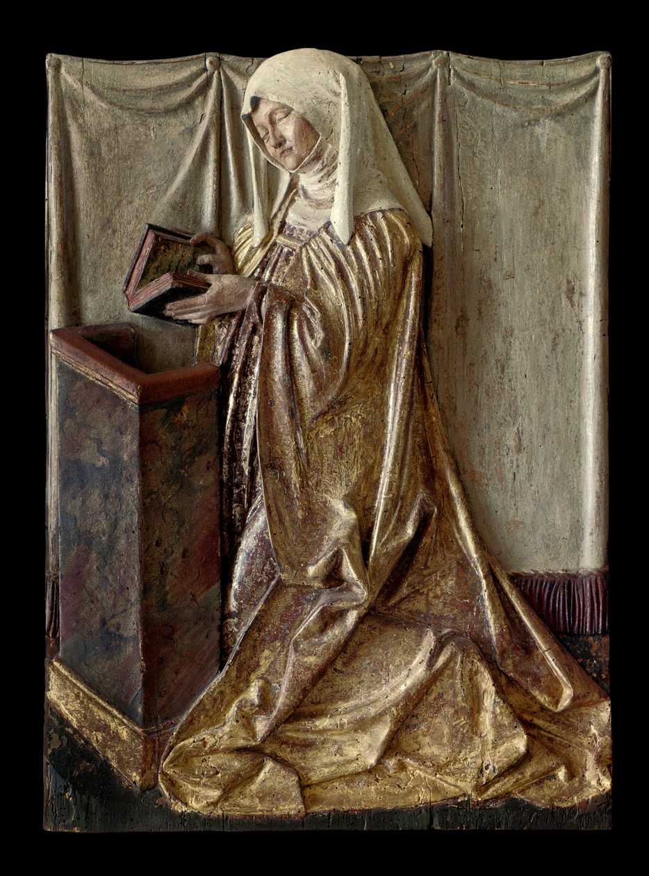 Fragmento de um retábulo esculpido em madeira policromada. Da Suábia. 1520 aproximadamente Paris, Museu do Louvre. de German School