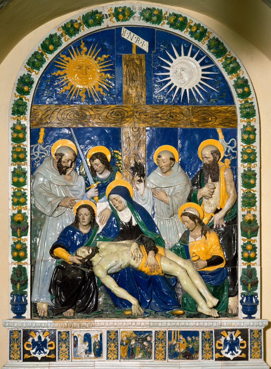 O Depósito (Pieta)". Jesus Cristo e a Virgem Maria rodeados por São João e Santa Maria Madalena diante da cruz com a inscrição INRI (I.N.R.I.) Cerâmica em alto relevo de Giovanni della Robbia (1469-1529) 1525 Dim. 287x210 cm Santuario della V de Giovanni della Robbia