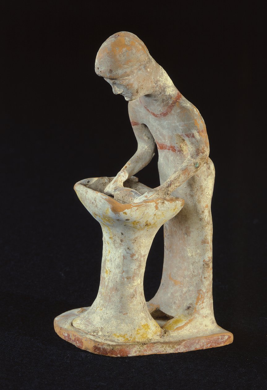 Estatueta de uma mulher rolando pastelaria, de Tanagra, Boeotia (argila) de Greek