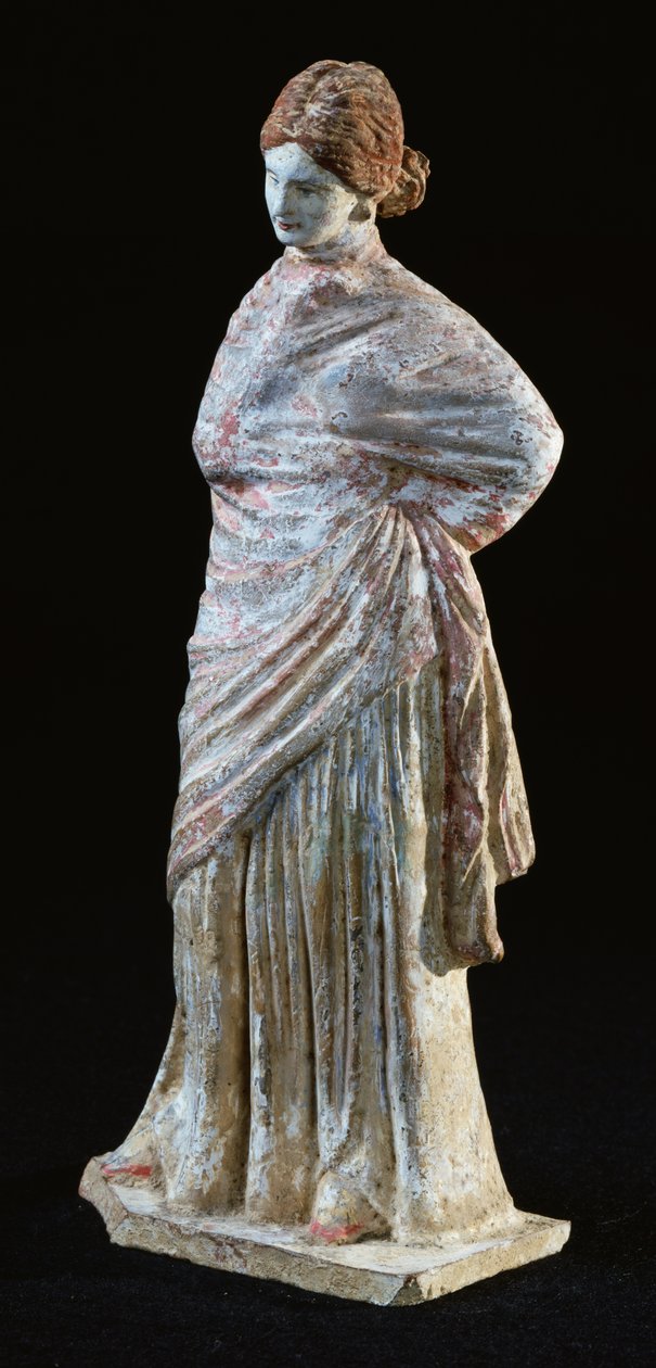 Estatueta de uma mulher com roupas drapeadas, de Tanagra, Boeotia de Greek