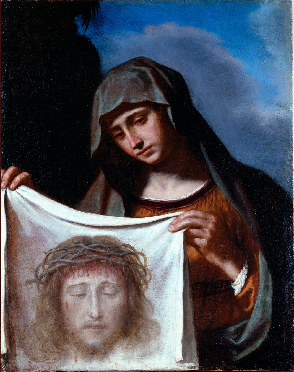Santa Verónica. O Santo Véu representa o rosto de Cristo, cujo suor Verónica foi dito ter suado durante a subida ao Calvário. Pintura de Giovanni Francesco Barbieri Guerchin dit Il Guercino (1591-1666) Genes do século XVII, Coleção Banca Ca de Guercino