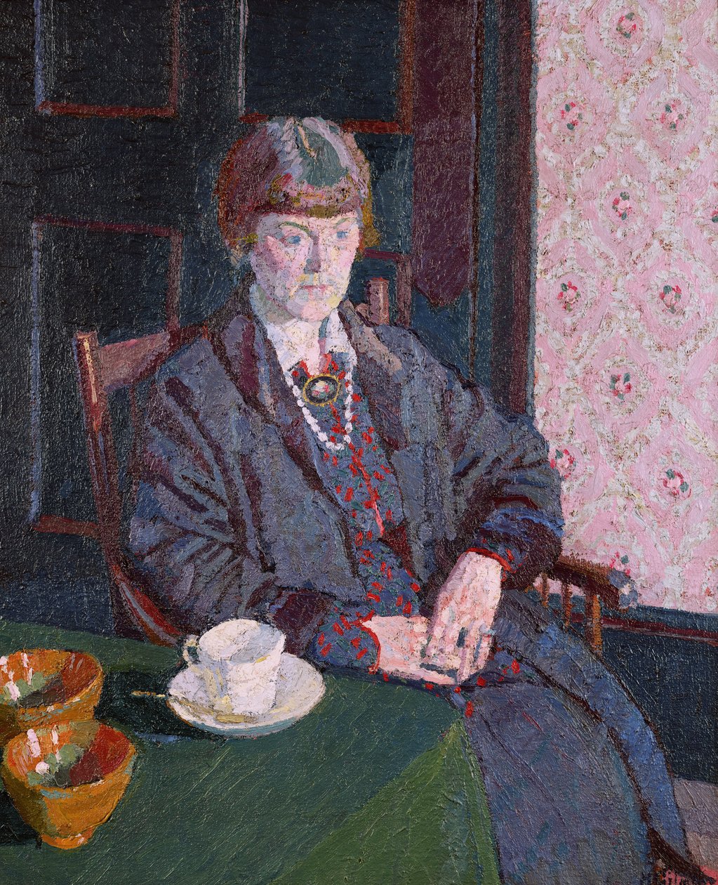 Mulher sentada em uma mesa de Harold Gilman