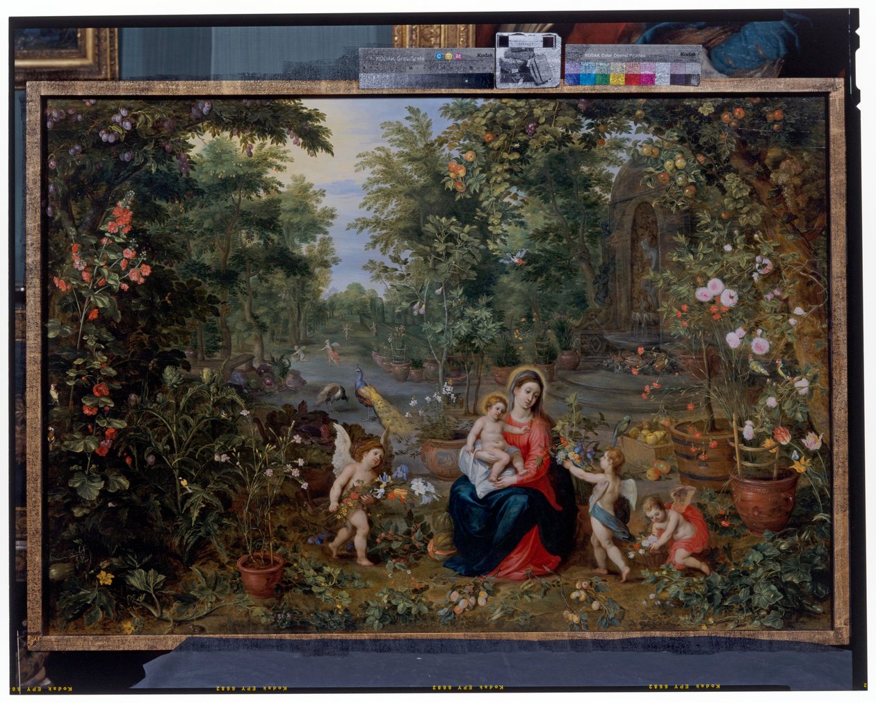 A Virgem e o Menino sentados num jardim com putti, aves e animais de Hendrik van the Elder Balen