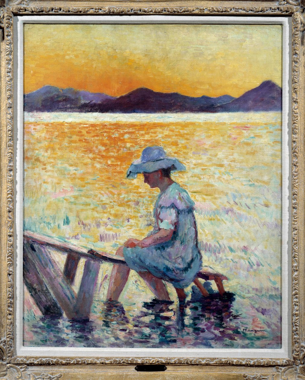 Santo Tropez, pôr-do-sol Uma mulher sentada na água na margem de Henri Charles Manguin