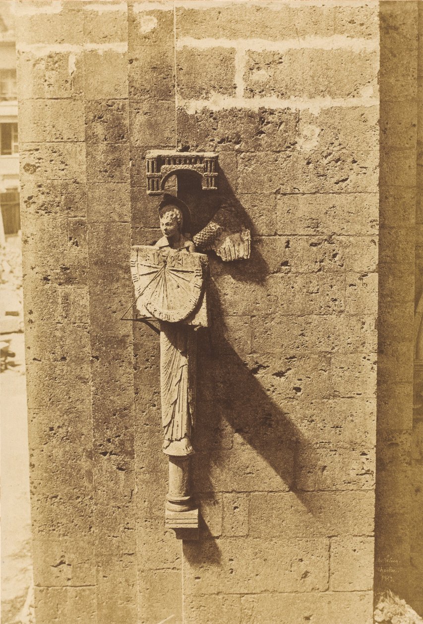 Anjo carregando um relógio de sol, na Igreja de Chartres de Henri Le Secq
