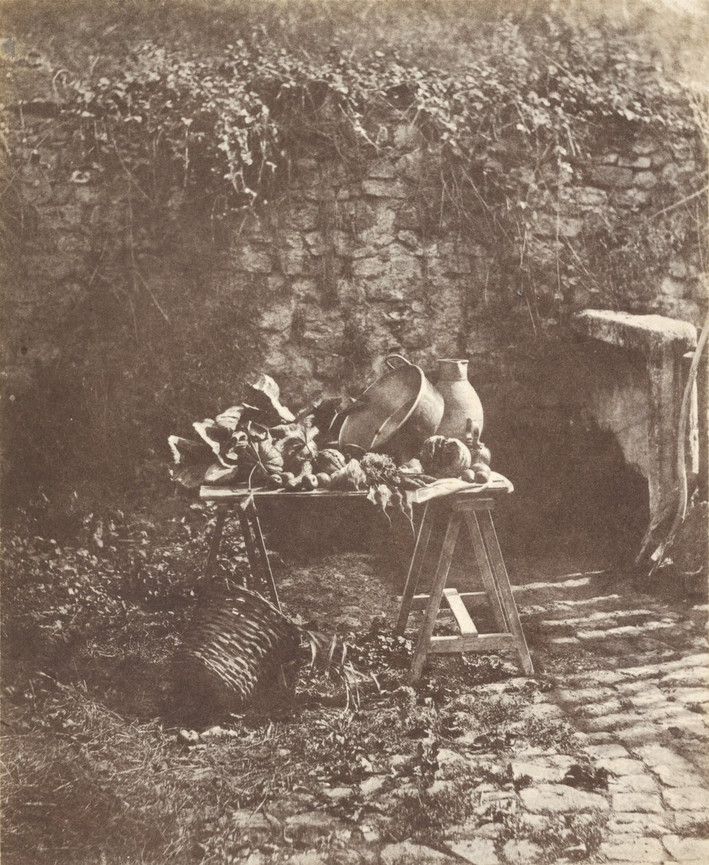 [Natureza morta: caldeirão, jarro e legumes sobre uma mesa de cavalete]. de Henri Victor Regnault