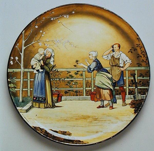 Infância, uma ilustração de "The Seven Ages of Man" de Shakespeare, placa carregador feita pelo Art Pottery Studio da Minton de Henry Stacey Marks